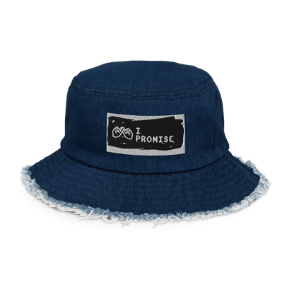 Navy blue bucket hat with a patch that says &