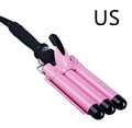 Pink hair curler with black handles on a white background, labeled 'US'.