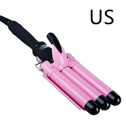 Pink hair curler with black handles on a white background, labeled 'US'.