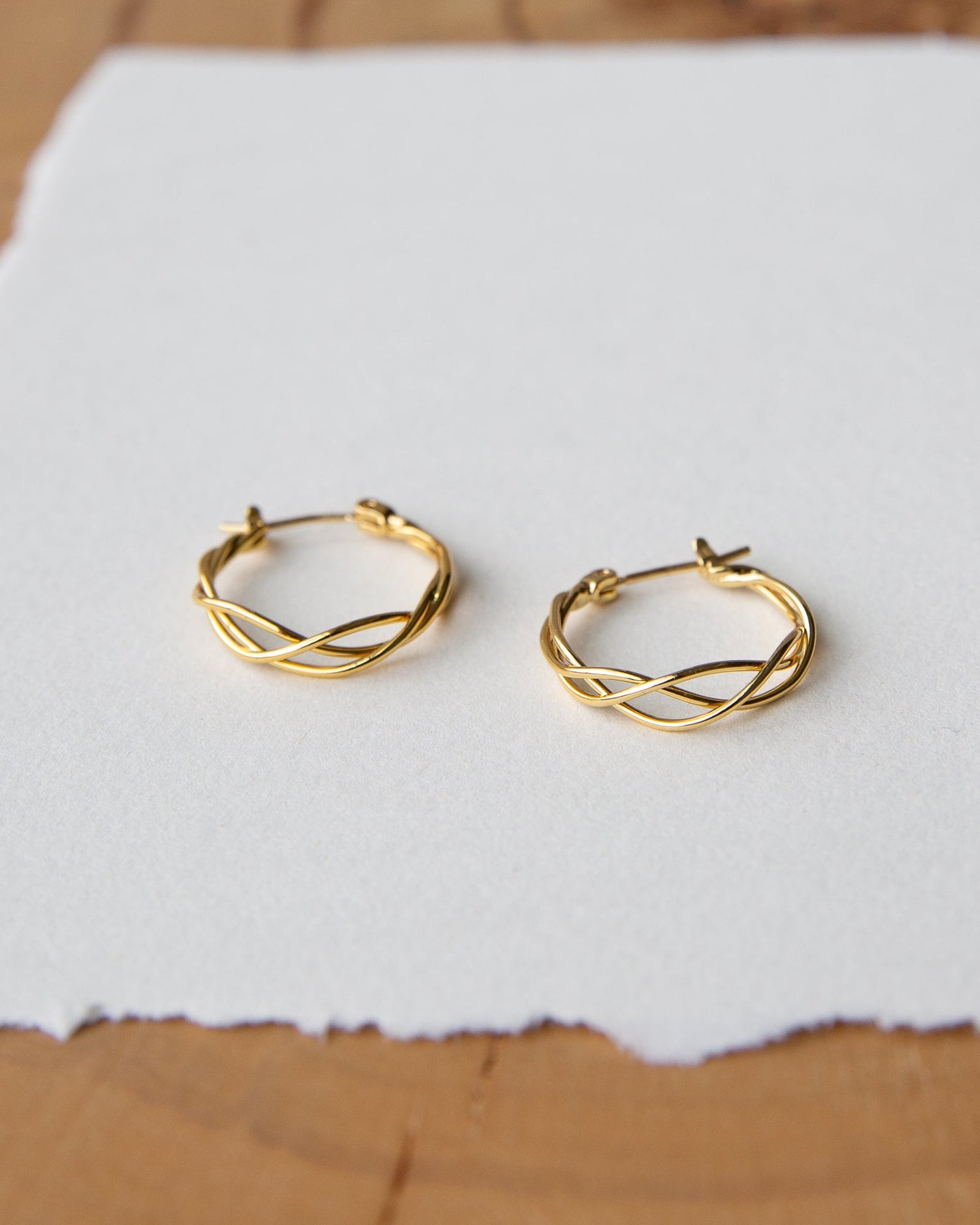 Braided Hoop Earrings featuring a distinctive woven texture, perfect for elevating everyday style.