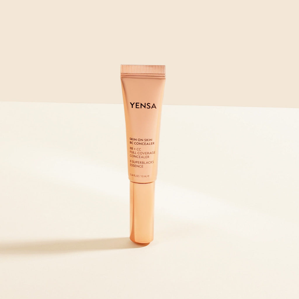 Yensa concealer tube on a beige background