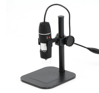 Digital microscope on a stand with a white background