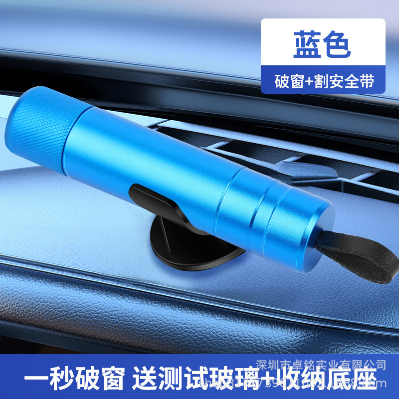 Blue car window breaker with suction cup on a car dashboard